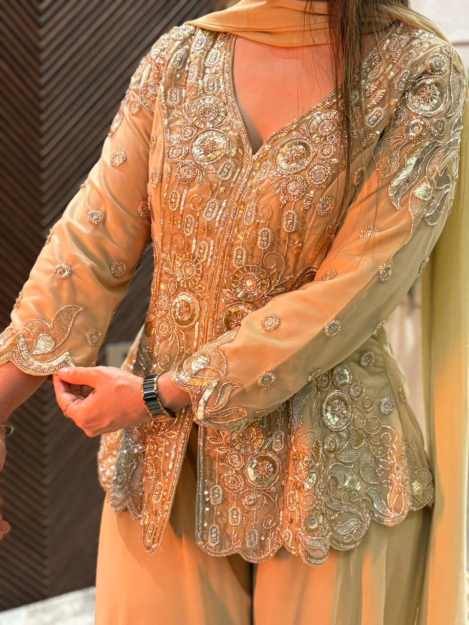 Stunning crop top set paired with a beautifully embroidered jacket.