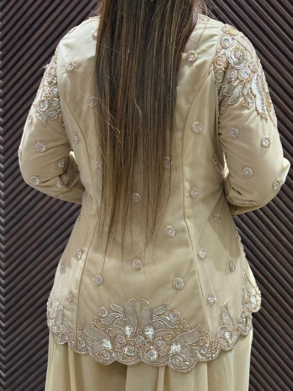 Stunning crop top set paired with a beautifully embroidered jacket.