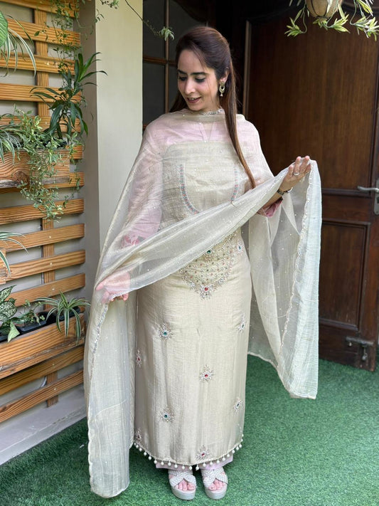 Unstitched suit in luxurious tissue shimmer fabric