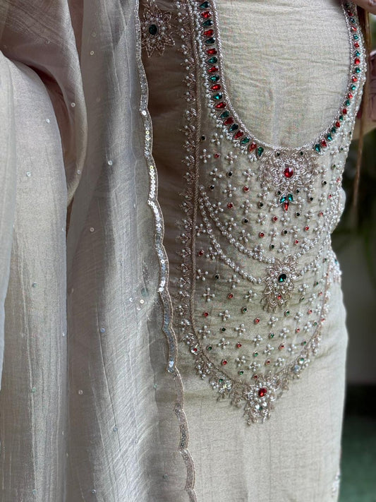 Unstitched suit in luxurious tissue shimmer fabric