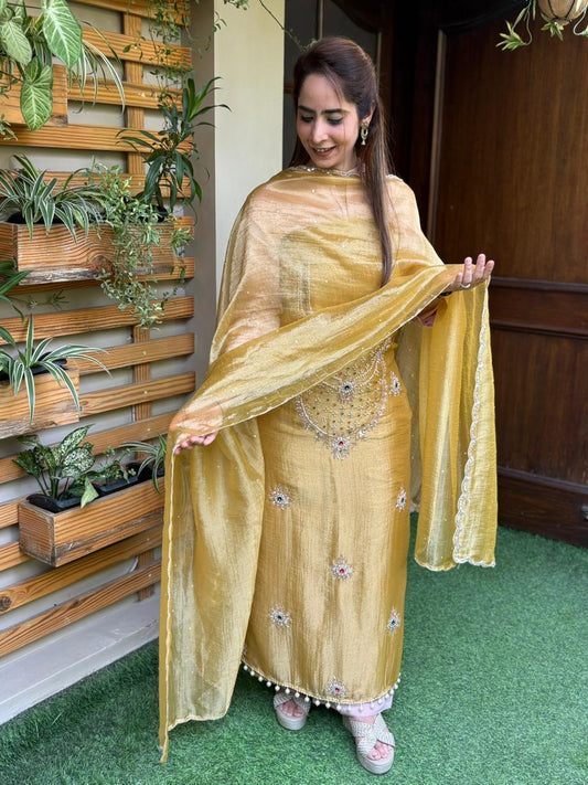 Unstitched suit in luxurious tissue shimmer fabric