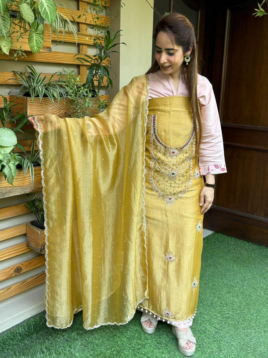 Unstitched suit in luxurious tissue shimmer fabric