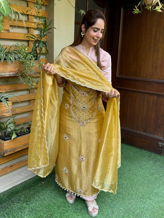 Unstitched suit in luxurious tissue shimmer fabric