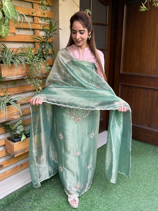 Unstitched suit in luxurious tissue shimmer fabric