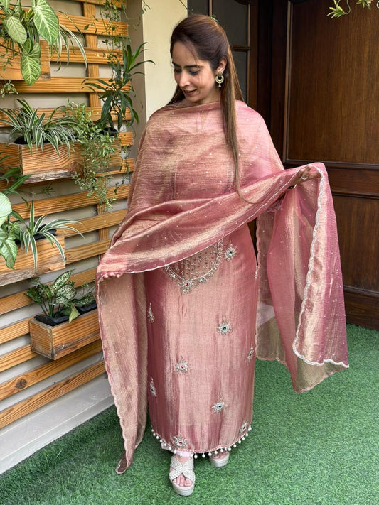 Unstitched suit in luxurious tissue shimmer fabric