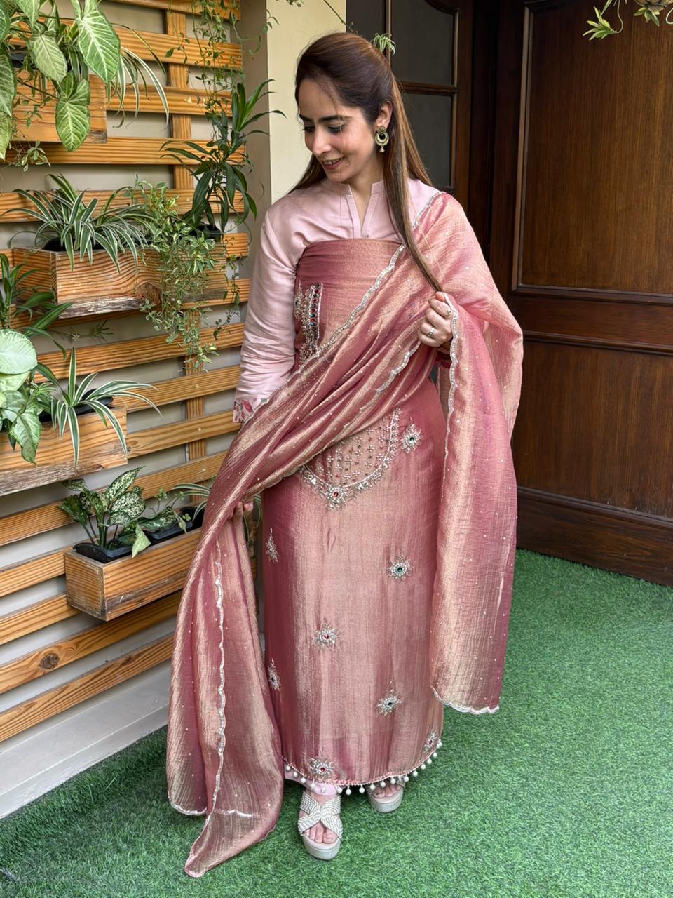 Unstitched suit in luxurious tissue shimmer fabric