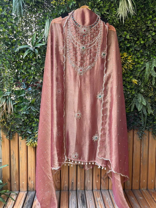 Unstitched suit in luxurious tissue shimmer fabric