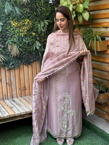 Unstitched suit crafted in rich tissue shimmer fabric