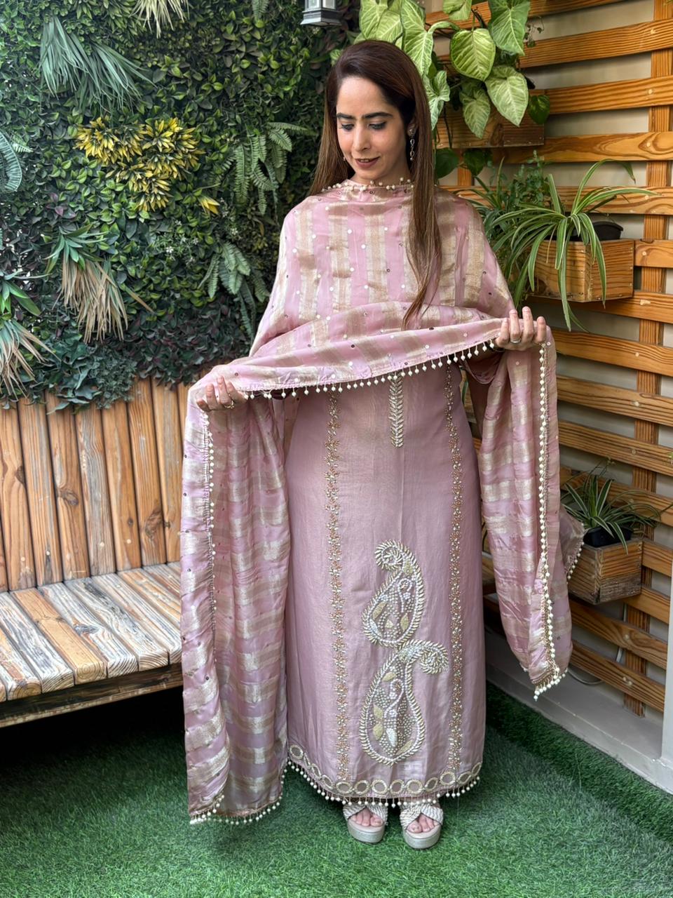 Unstitched suit crafted in rich tissue shimmer fabric