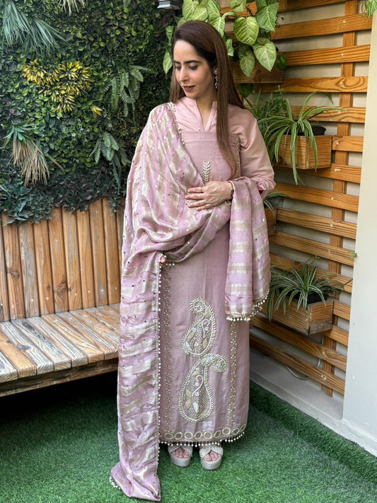 Unstitched suit crafted in rich tissue shimmer fabric