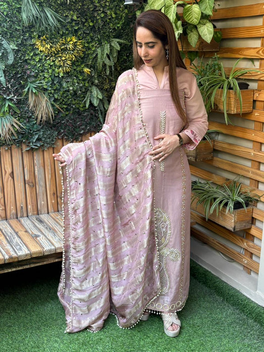 Unstitched suit crafted in rich tissue shimmer fabric