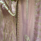 Unstitched suit crafted in rich tissue shimmer fabric