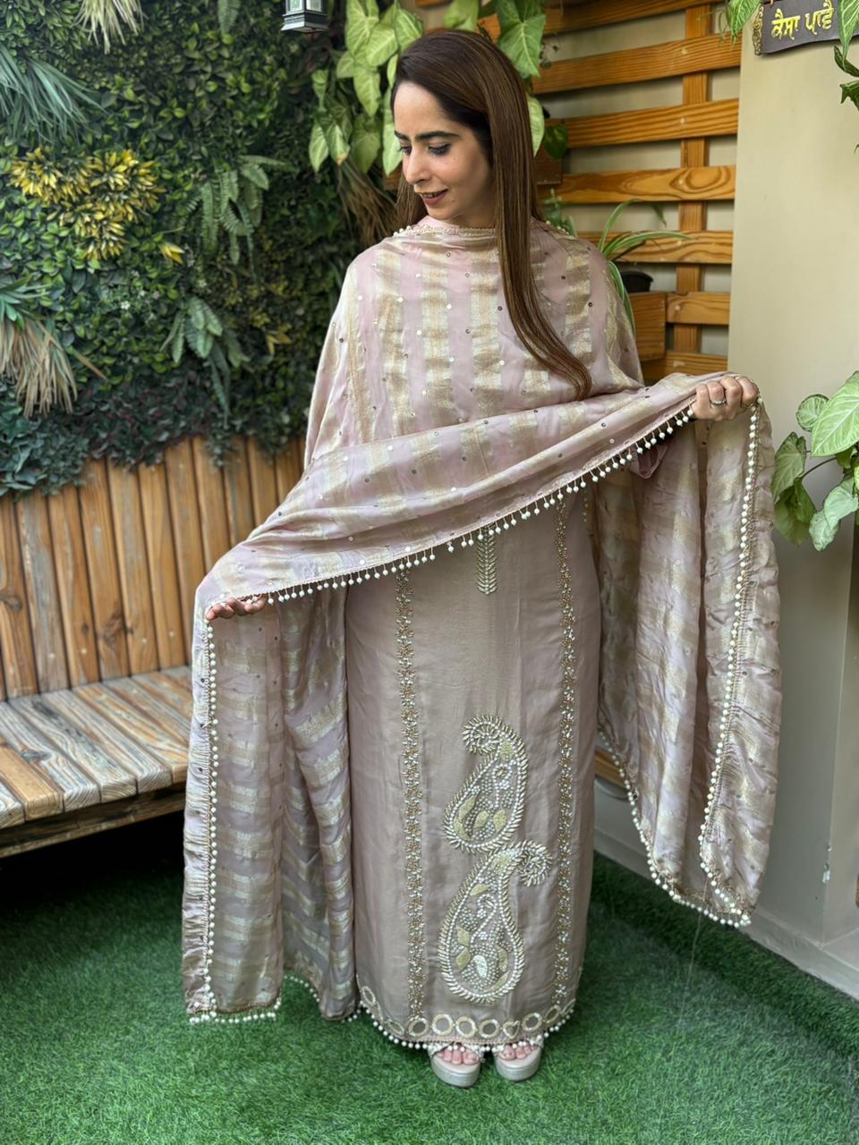 Unstitched suit crafted in rich tissue shimmer fabric