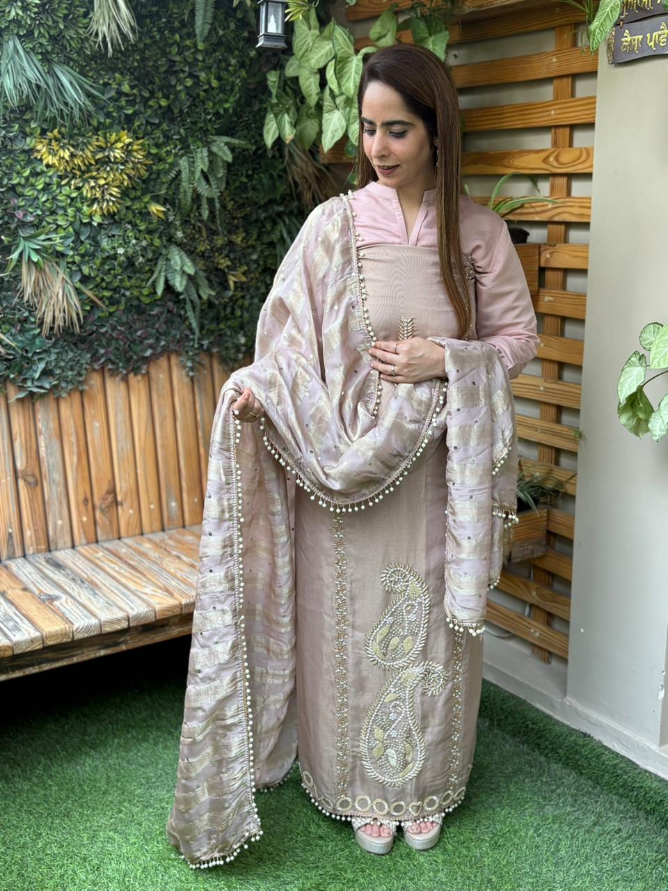 Unstitched suit crafted in rich tissue shimmer fabric