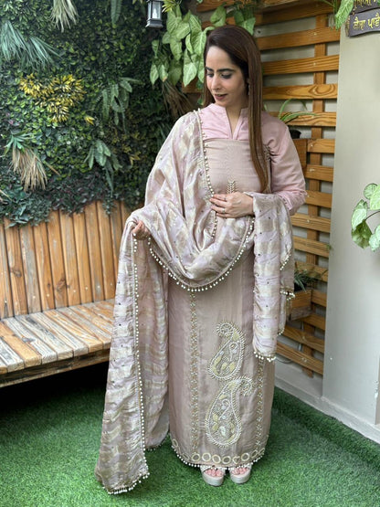 Unstitched suit crafted in rich tissue shimmer fabric