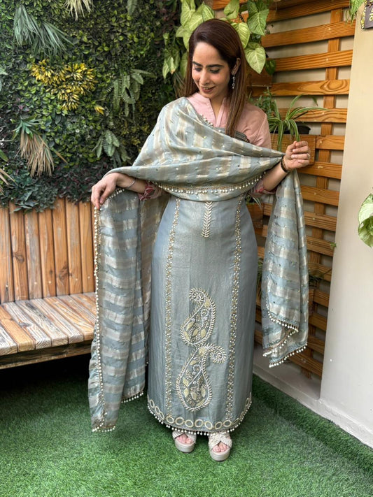 Unstitched suit crafted in rich tissue shimmer fabric