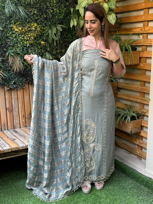 Unstitched suit crafted in rich tissue shimmer fabric