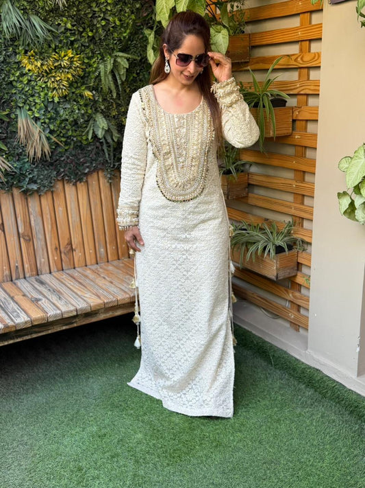 Beautifully adorned with intricate chikankari embroidery