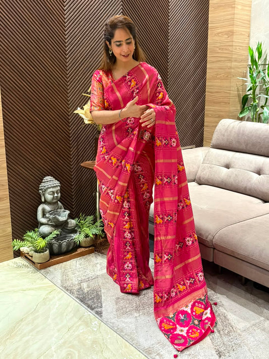 Elegant Patola Running Saree paired with an unstitched blouse