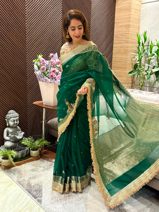 Crafted in luxurious soft organza running saree