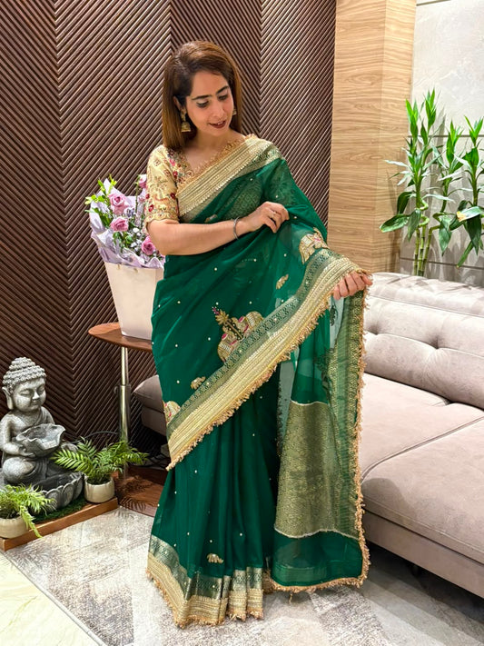 Crafted in luxurious soft organza running saree