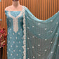 Elevate your festive wardrobe with this exquisite unstitched suit set