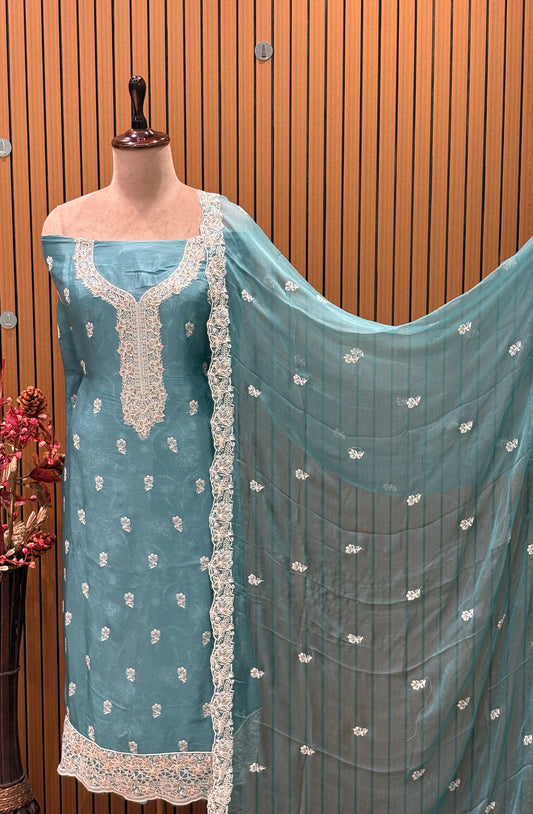 Elevate your festive wardrobe with this exquisite unstitched suit set