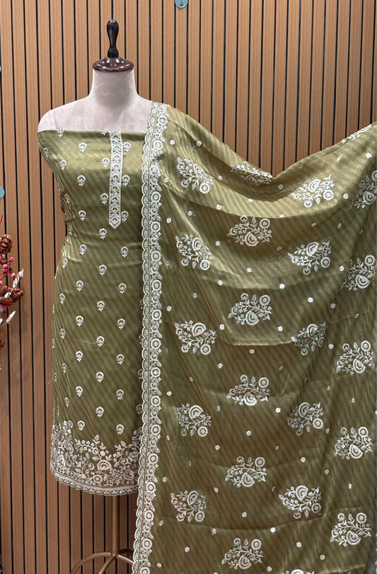 Elevate your festive wardrobe with our luxurious unstitched suit set